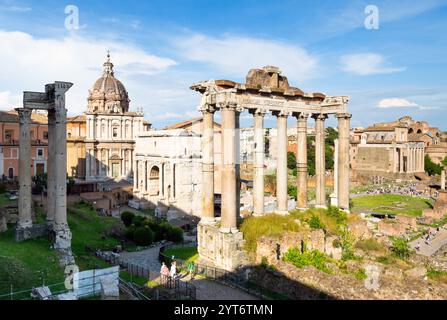 View towards (left to right) The Temple of Vespasian and Titus, Church of Santi Luca e Martina, Arch of Septimius Severus and The Temple of Saturn in Stock Photo