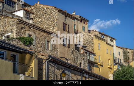 House facades in Roquebrun. The commune is located in the Haut-Languedoc Regional Nature Park. Stock Photo