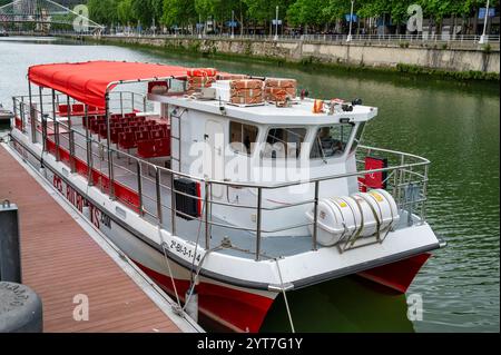 Bilbao, Spain- May 27, 2024: One of Bilboats.com tourist boats on the river Nervión in Bilbao Stock Photo