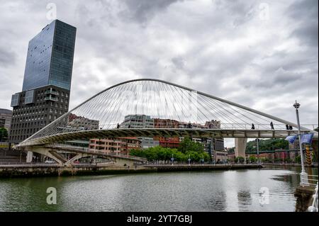 Bilbao, Spain- May 27, 2024: Zubizuri Pedestrian bridge over  the river Nervión in Bilbao Stock Photo