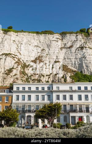 England, Kent, Dover, Colourful Housing and the White Cliffs of Dover Stock Photo