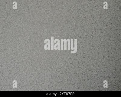 gray plain paper background with soft ribbed texture with abstract perforation, monochrome graphic resource with fine textured pattern Stock Photo