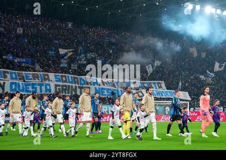 Bergamo, Italia. 06th Dec, 2024. Teams enter on the pitch during the Serie A soccer match between Atalanta and Ac Millan at the Gewiss Stadium in Bergamo, north Italy - Friday, December 6, 2024. Sport - Soccer . (Photo by Spada/Lapresse) Credit: LaPresse/Alamy Live News Stock Photo