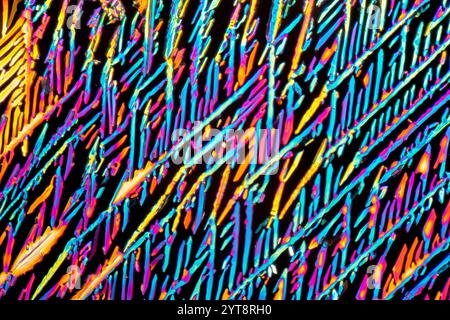 Colorful microscopic shot of sodium nitrate microcrystals in polarized light Stock Photo