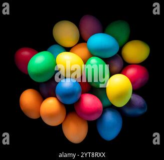Detail shot of some colorful easter eggs in black back Stock Photo