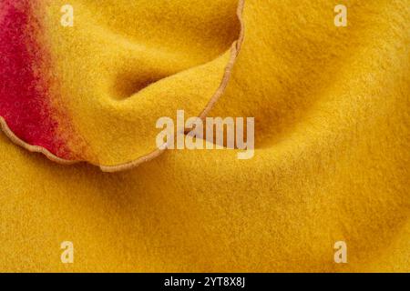 Mostly yellow full frame felt fabrics closeup shot Stock Photo