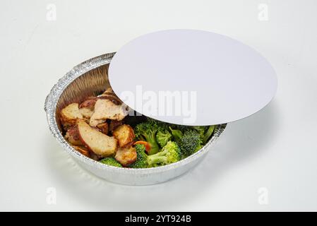 Round aluminum take out take away container with lid Stock Photo