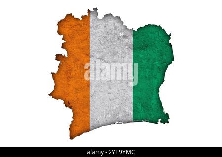 Map and flag of Ivory Coast on weathered concrete Stock Photo