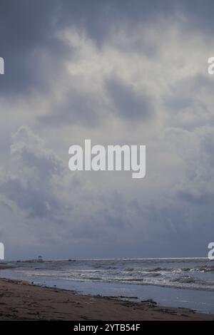 Dark clouds and unfriendly weather indicate that there will be a storm on the coast of Balikpapan Stock Photo