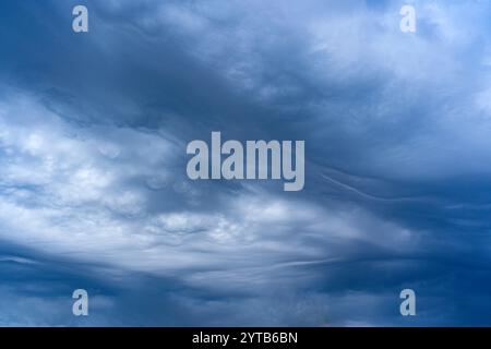 Breathtaking Heavy Rain Undulatus asperatus Clouds Wavy Texture. Stock Photo