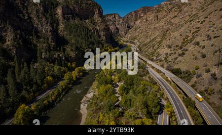 SEPT 29, 2023 - GLENWOOD SPRINGS, CO., USA - Interstate 70 seen from air shows Glenwood Springs and Colorado RIver in Autumn Stock Photo