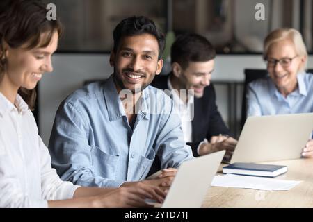 Colleagues working together, engaged in project discussion, office portrait Stock Photo