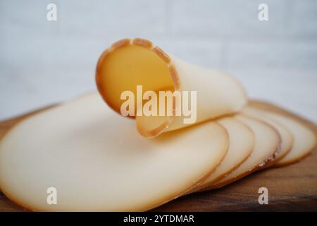 Smoked cheese. Dutch sliced cheese Stock Photo