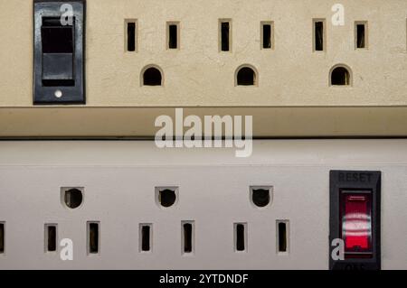 Power distribution strips with on off reset button Stock Photo