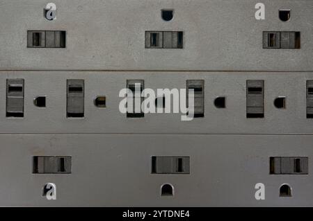 Power strip outlets in a close up Stock Photo