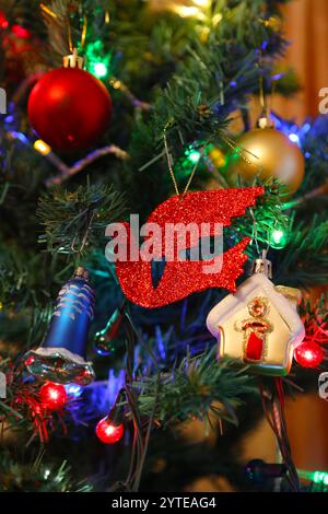 Different beautiful decorations on the Christmas tree, close-up Stock Photo