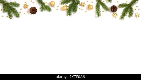 Christmas border with fir branches, cones and golden decorations isolated on a white background. New Year greeting card. Space for text. Stock Photo