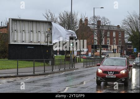 Alcester Road, Birmingham 7th December 2024 - A biilboard has been ripped apart in the Balsall Heath area of Birmingham by strong Storm Darragh winds Credit: British News and Media/Alamy Live News Stock Photo