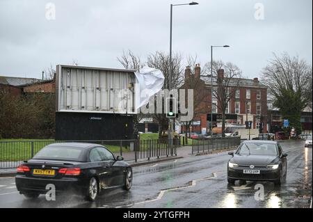 Alcester Road, Birmingham 7th December 2024 - A biilboard has been ripped apart in the Balsall Heath area of Birmingham by strong Storm Darragh winds Credit: British News and Media/Alamy Live News Stock Photo