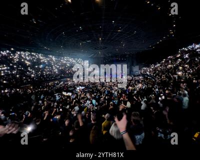 DECEMBER 12, 2023 - LOS ANGELES, CA. - USA - Crowd with iPhone flashlights on - Depech Mode performs at Forum Los Angeles, CA Stock Photo