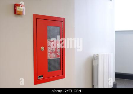 Dry Riser Outlet in stairwell of multi-storey building. Dry risers are ...