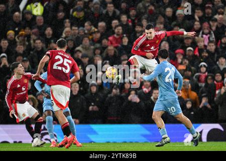 Diogo Dalot Of Manchester United Clears The Ball During The Premier 