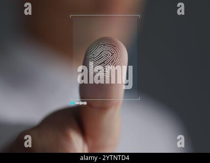 Man pressing finger to surface showing friction ridges pattern, closeup. Scanning fingerprint Stock Photo