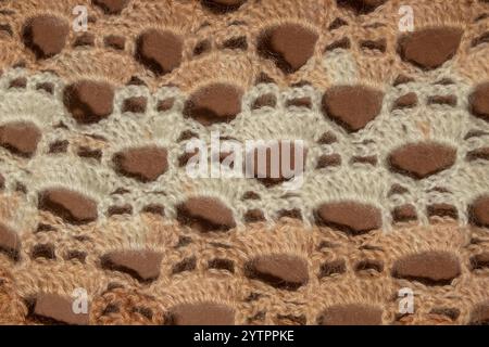Wool hand-knit mocha, beige and brown shade sweater. Clothes textile background Stock Photo