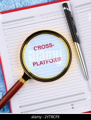 Context Marketing concept. Text CROSS-PLATFORM in the business notebook. Copy space. Stock Photo