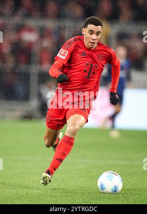 MUNICH, GERMANY - DECEMBER 07: Jamal Musiala of Bayern Muenchen runs with a ball during the Bundesliga match between FC Bayern München and 1. FC Heidenheim 1846 at Allianz Arena on December 07, 2024 in Munich, Germany. © diebilderwelt / Alamy Stock Stock Photo