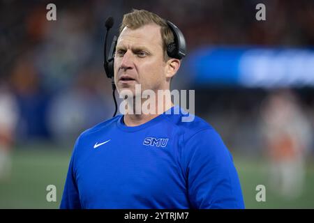 SMU head coach Rhett Lashlee celebrates on the field with fans after ...