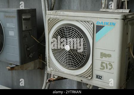Jakarta, Indonesia- 22 November 2024: old unit of Daikin AC outdoor unit on the outside. Stock Photo