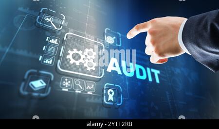 Audit. Checking the financial statements of the company. Businessman touching Audit on 3d virtual screen Stock Photo