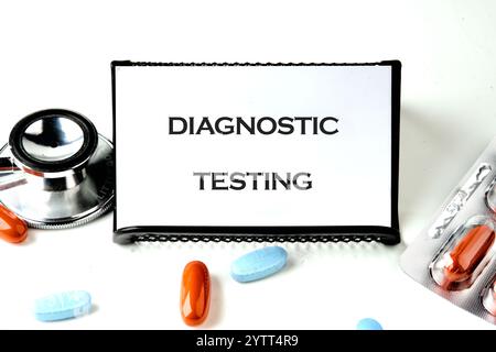 Diagnostic testing is highlighted with a stethoscope, various medications, and a clear sign. The items are arranged neatly on a white surface, showcas Stock Photo