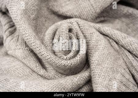 Grey wool sweater texture as a background. Top view. Stock Photo