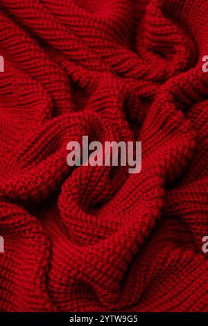 Red sweater texture as a background. Top view Stock Photo