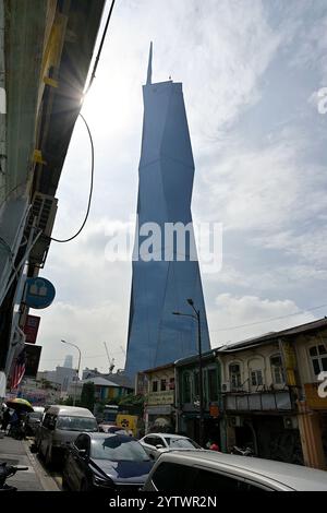 The Merdeka 118 juxtaposed against traditional Straits Chinese style shophouses along Jalan Sultan leading to Chinatown KL Stock Photo