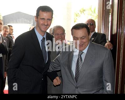 Riyadh, Saudi Arabia. 08th Dec, 2024. In just over ten days, Syrian rebels have taken control of Syria's main cities, including the capital Damascus on Saturday night. President Bashar al-Assad, in power since 2000, has fled the country, according to Russia - FILE - FILE PHOTO - Syrian president Bashar Al Assad meets with Egyptian president Hosni Mubarak (R) as Arab League leaders summit ends in Riyadh, Saudi Arabia, on March 29, 2007. Photo by Balkis Press/ABACAPRESS.COM Credit: Abaca Press/Alamy Live News Stock Photo