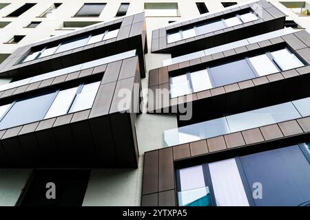 Modern Apartment Building with Large Glass Windows and Minimalist Architectural Design Stock Photo