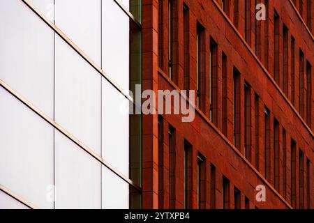 Brick Facade Office Building with Symmetrical Windows and Modern Architectural Features Stock Photo