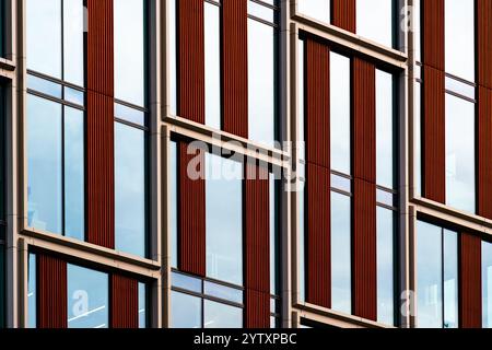 Brick Facade Office Building with Symmetrical Windows and Modern Architectural Features Stock Photo