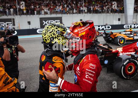 Abu Dhabi, Abu Dhabi. 08th Dec, 2024. Race winner Lando Norris (GBR) McLaren celebrates winning the Constructors' Championship at the end of the race in parc ferme with second placed Carlos Sainz Jr (ESP) Ferrari. 08.12.2024. Formula 1 World Championship, Rd 24, Abu Dhabi Grand Prix, Yas Marina Circuit, Abu Dhabi, Race Day. Photo credit should read: XPB/Alamy Live News. Stock Photo