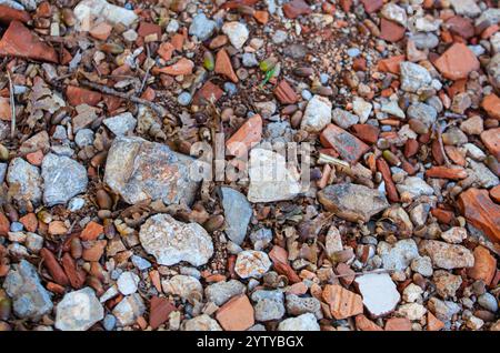 Stones of different colors. Coarse texture. Material for construction. Cobbles of different sizes. Stock Photo