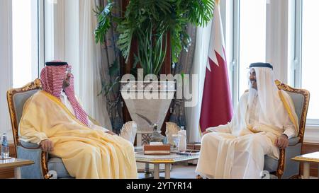 Qatari Emir Sheikh Tamim bin Hamad Al Thani receives Prince Turki bin Mohammed bin Fahd bin Abdulaziz Al Saud Qatari Emir Sheikh Tamim bin Hamad Al Thani receives Prince Turki bin Mohammed bin Fahd bin Abdulaziz Al Saud, Minister of State and Member of the Council of Ministers of the Kingdom of Saudi Arabia, and the accompanying delegation, in his office at the Emiri Diwan, in Qatar, on December 08 , 2024. Photo by Emiri Diwan Office apaimages Doha Doha Qatar 081224 Qatar QPO 002 Copyright: xapaimagesxEmirixDiwanxOfficexxapaimagesx Stock Photo