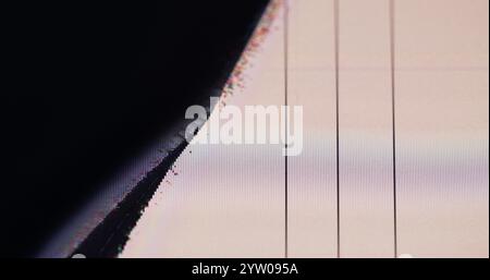 Screen error. Broken LCD. Demo equipment dead zone with damaged pixels. Grainy grunge blur television glitch texture with black area and lines. Stock Photo