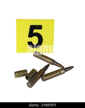 Shell casings and crime scene marker with number Stock Photo - Alamy