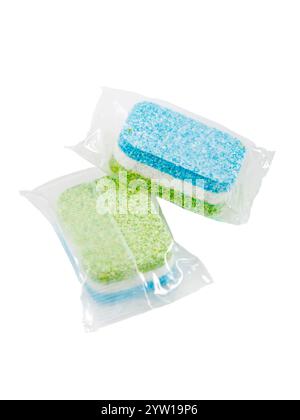 Tablets for washing dishes in the dishwasher. Two tablets isolated on a white background. Stock Photo