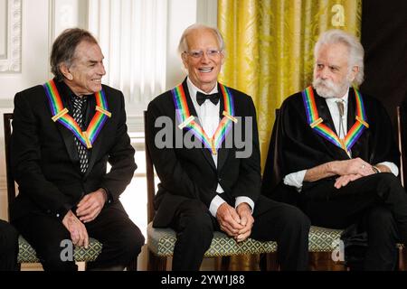 Washington, United States. 08th Dec, 2024. Mickey Hart (left), Bill Kreutzmann (center), and Bobby Weir (right) of the Grateful Dead during a reception for the 47th Kennedy Center Honorees in the East Room of the White House on December 8, 2024 in Washington, DC The honorees this year include filmmaker Francis Ford Coppola, members of the Grateful Dead, country musician Bonnie Raitt, musician Arturo Sandoval, and The Apollo theater organization. (Photo by Samuel Corum/Sipa USA) Credit: Sipa USA/Alamy Live News Stock Photo