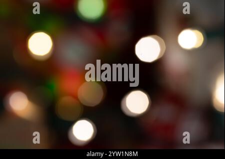 Out of focus red, white, and green lights creating a bokeh effect Stock Photo