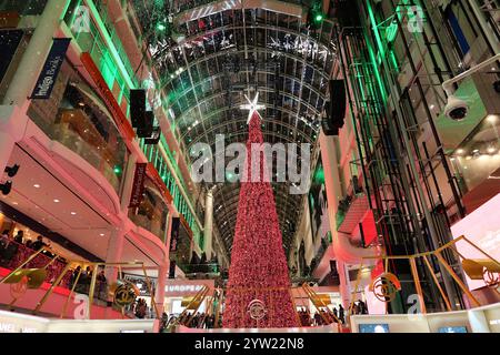 Toronto, Canada - December 8, 2024:  Toronto's Eaton Center is a multi-level indoor mall, with bright Christmas decorations Stock Photo